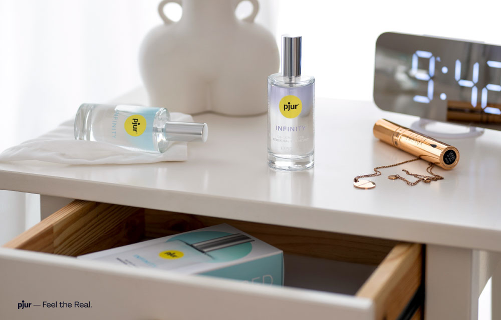 personal-lubricant-in-glass-bottle-on-modern-nightstand