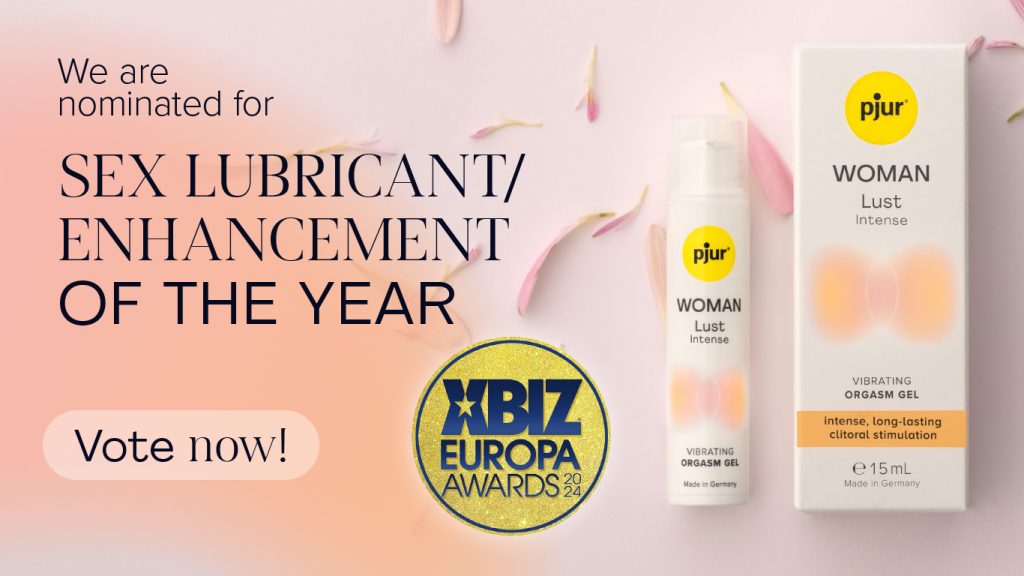 pjur WOMAN Lust Intense stimulation gel with packaging and bottle, XBIZ Europa Awards 2024 badge, “Vote now!” button, and text “We are nominated for SEX LUBRICANT/ENHANCEMENT OF THE YEAR”.